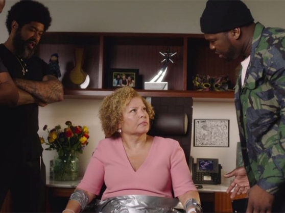 50 Cent interrogates an elderly woman in a sketch during 50 Central 50 Cent interrogates an elderly woman in a sketch during 50 Central