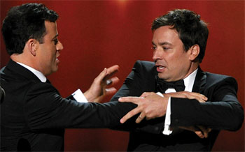 jimmy-fallon-jimmy-kimmel wrestle onstage at the Academy Awards 2014