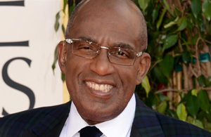 al roker in black and white suit on red carpet