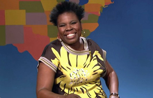 Leslie Jones wearing black and yellow shirt